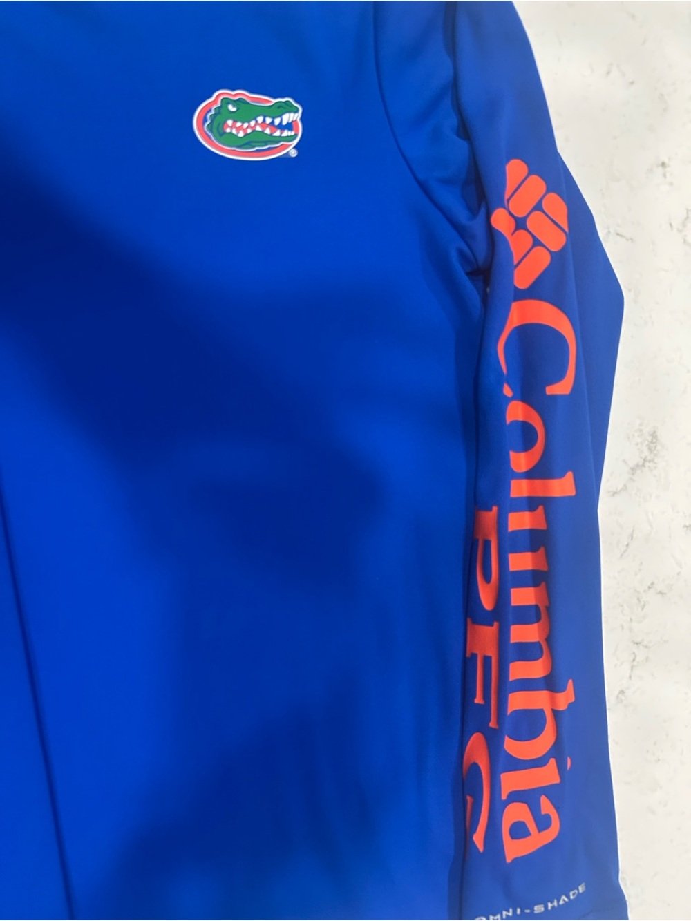 Columbia Kids Blue Rash Guard with Orange Sleeve Logo